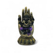 Purple, Gold & Black Ganesh statue in hand